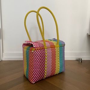 Handmade woven bag made with sturdy plastic, from artisanal flea market in NYC